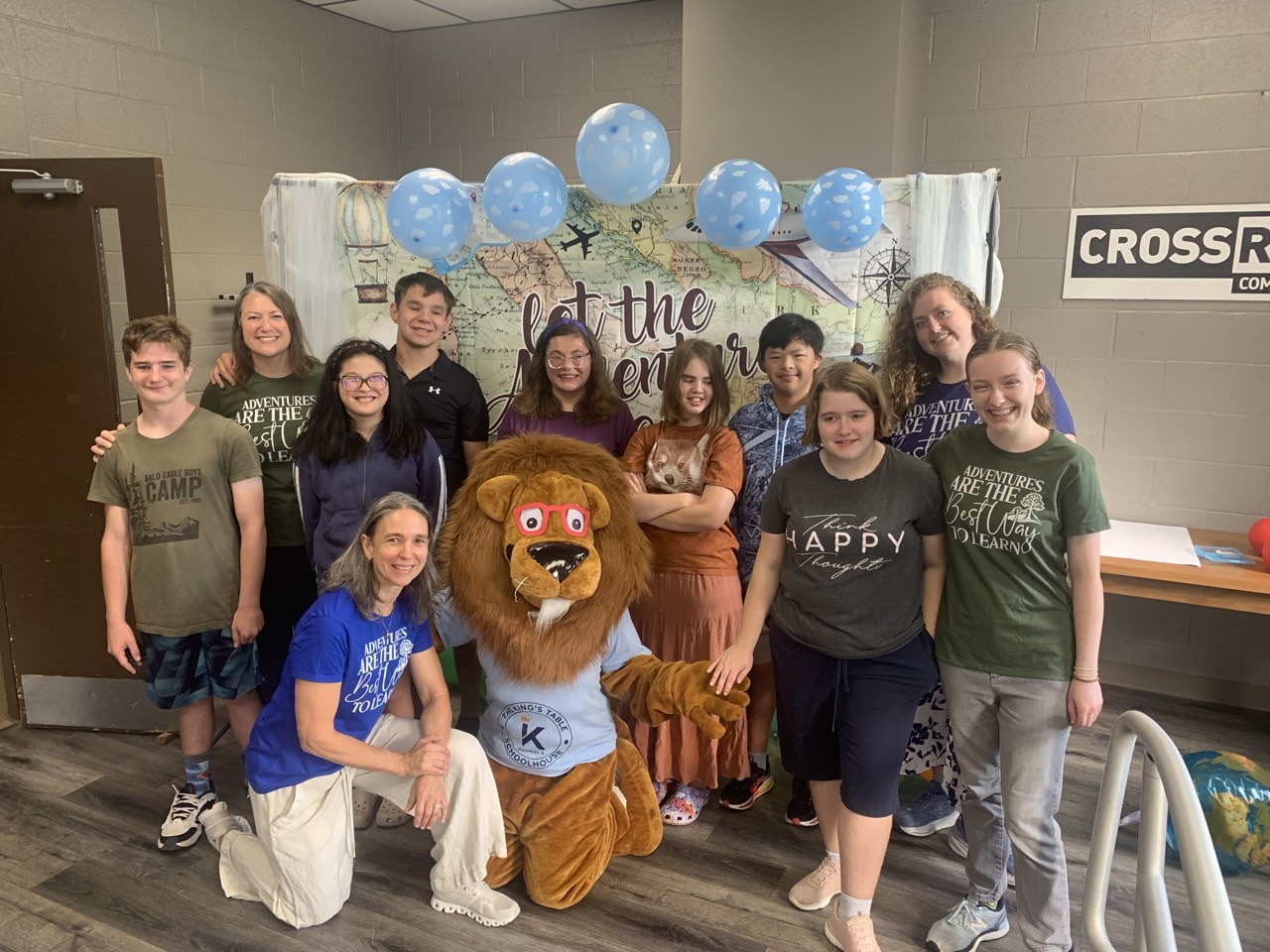 Students, teachers and the King’s Table lion mascot gathered at the school’s adventure celebration